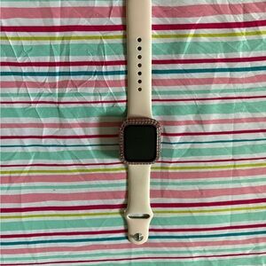 Apple Smartwatch with Cream Band and Pink Frame